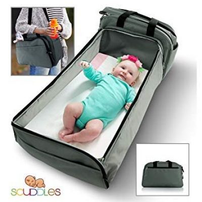 Travel Bassinet Functions As Diaper Bag And Changing Station